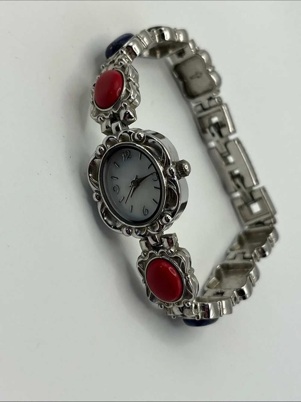 Stainless Steel Bracelet Watch with multi colored stones.